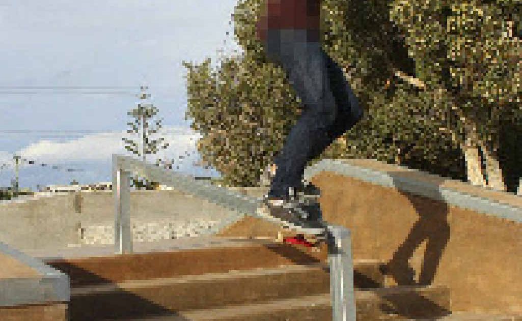 An unidentified skate boarder flirting with danger at the still-to-be-finished skate park facility. An unidentified skate boarder flirting with danger at the still-to-be-finished skate park facility.